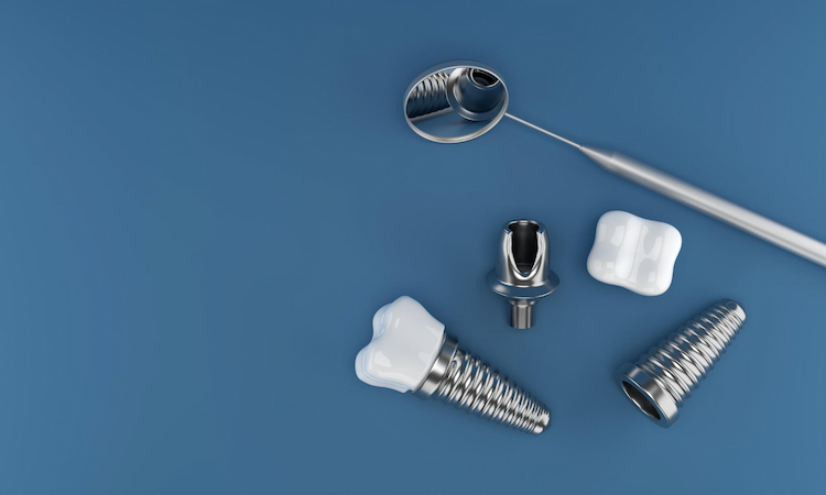 different parts of a dental implant with a dental mirror. 