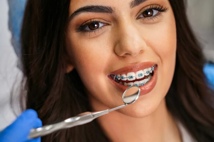 A picture of a girl with dental braces